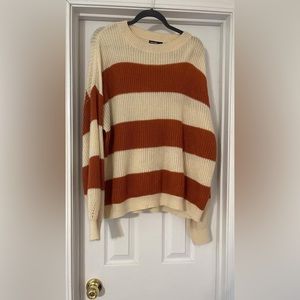 Burnt orange and cream cable sweater